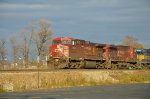 CP AC44CW Locomotives leading a train